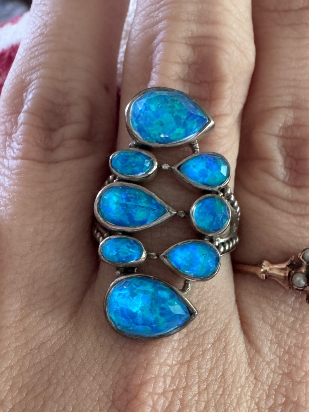 Sajen Sterling Ring with Bright Blue Opal Teardrops